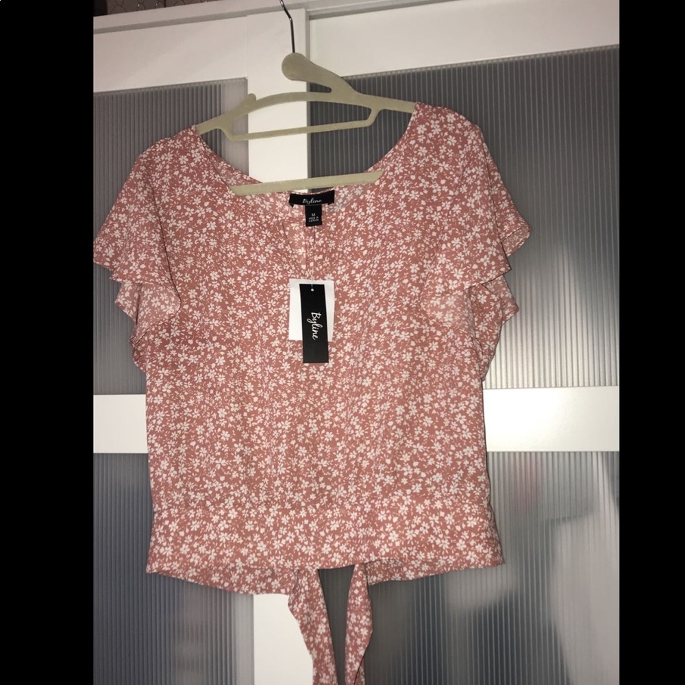 pink and white flower blouse